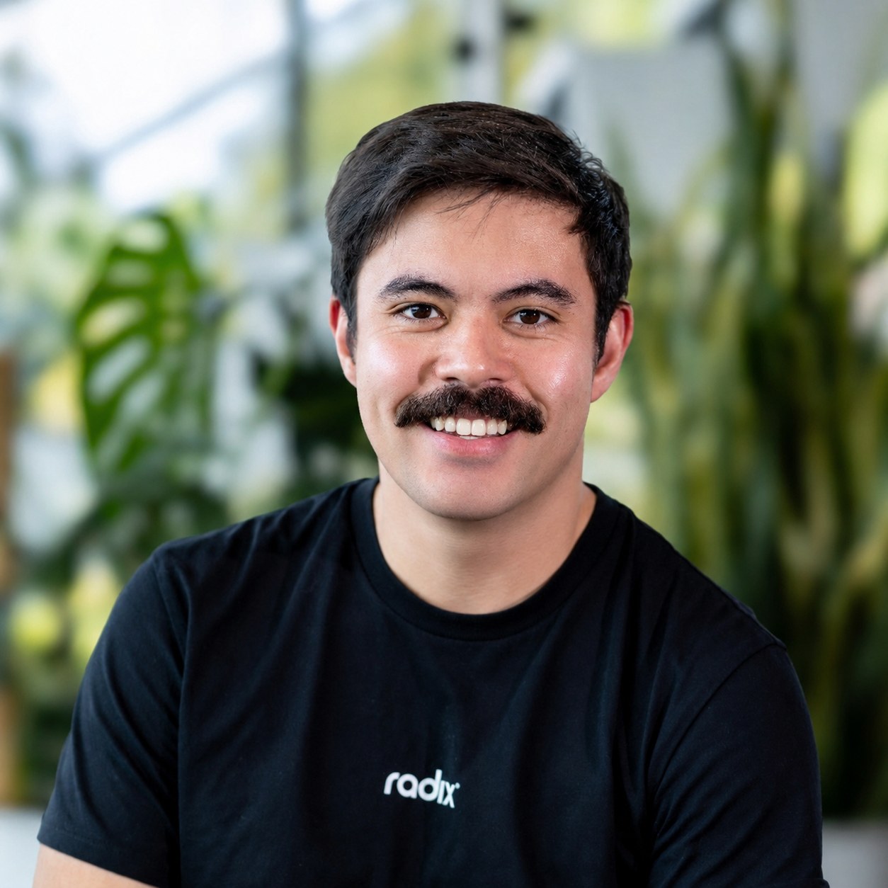 Portrait of Robert Spencer in a Radix Nutrition shirt